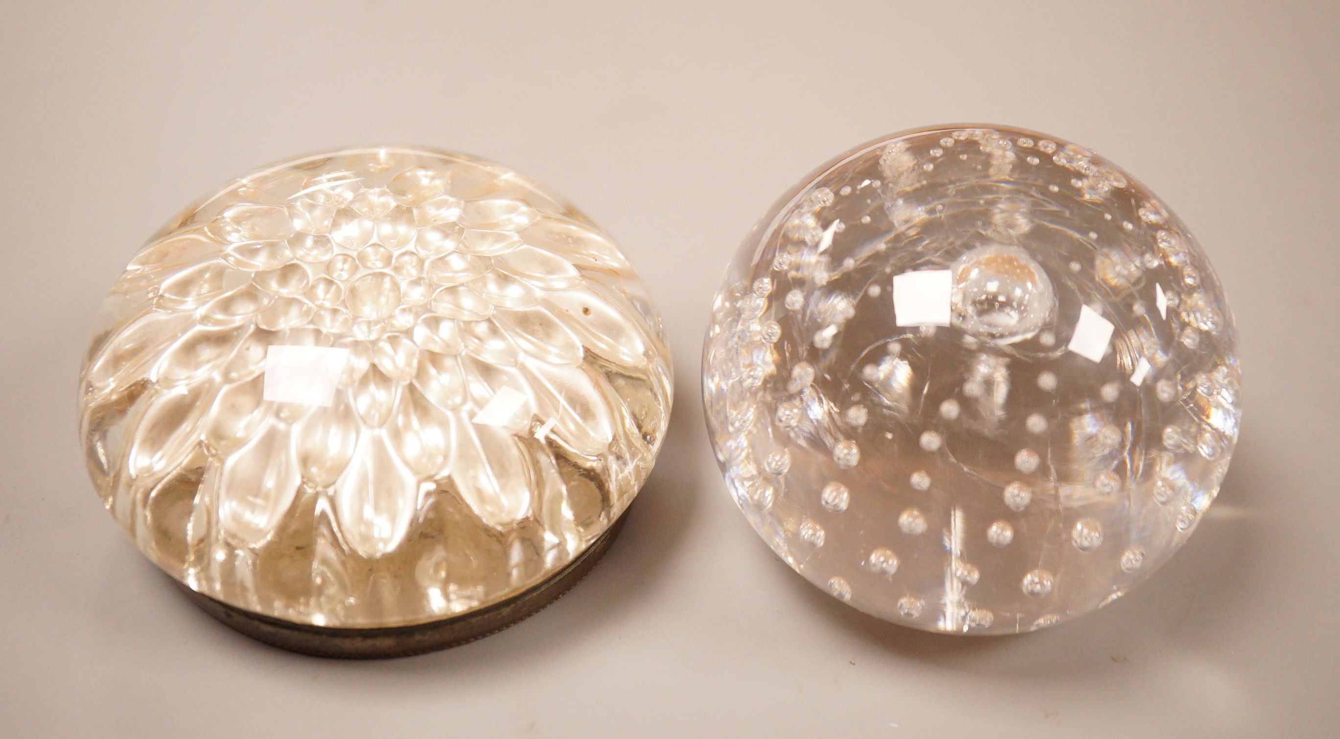 A early 20th century French glass paperweight together with another